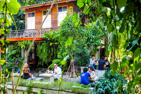 Chiang Mai, THAILAND - January 29, 2017: coffee house is a wooden house in the garden is a favorite of people  at BannKangWat Chiang Mai Thailand.のeditorial素材