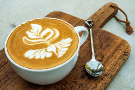 Coffee cup on a wooden table.の写真素材