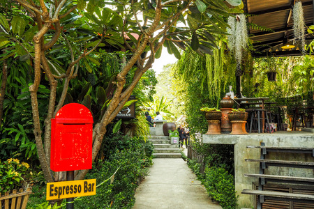 Chiang Mai, THAILAND - January 29, 2017: Entrance to the cafe with many trees and espresso text at BannKangWat Chiang Mai Thailand.のeditorial素材