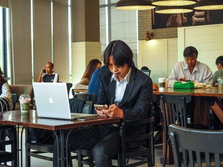 BANGKOK, THAILAND - APRIL 18, 2017: Starbucks Cafe interior. Starbucks Corporation is an American global coffee company and coffeehouse chain based in Seattle, Washingtonのeditorial素材