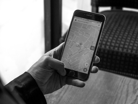 BANGKOK , THAILAND - April 18,2017: Google Maps application on Apple iPhone. Google Maps is a service that provides information about geographical regions and sites around the world.のeditorial素材