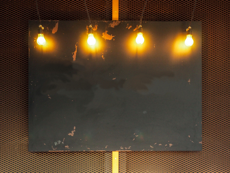 Background Billboards , rust on a metal platewith lightsの写真素材