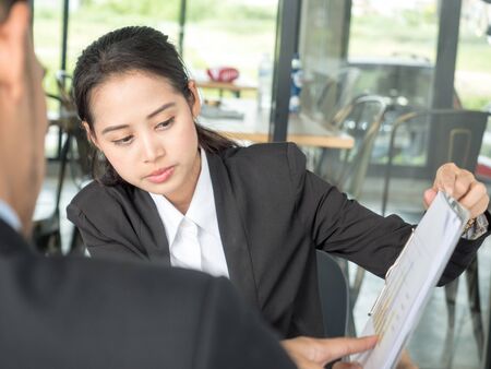 business women conference presentation with team training flipchart in the meeting room.の写真素材