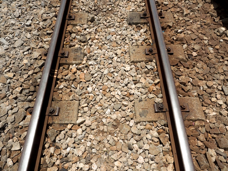Railway or railroad tracks for train transportation.の写真素材