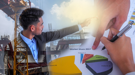 businessman looking at Business plan. The concept of success, leadership and victory in business.の写真素材