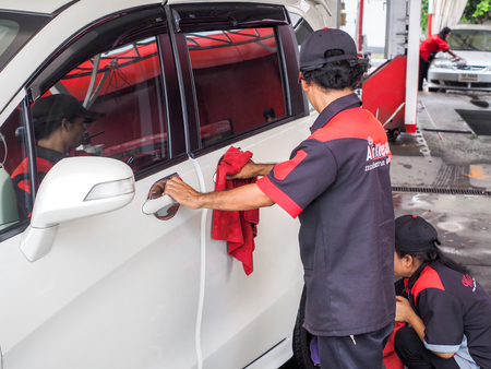 BANGKOK - SEP 27  team service mechanic cleaning automobile car at auto Wash a car shop,editorialのeditorial素材