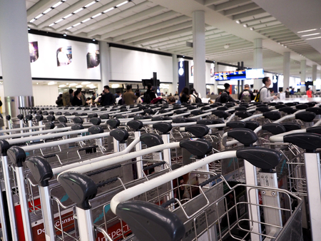 luggage carts at airport terminal