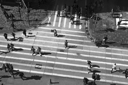 HONGKONG, CHINA - December 8 2016: Black and white tone Unidentified pedestrians on zebra crossing...