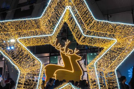 BANGKOK - December 23: Christmas decorated with deer and stars for a Merry Christmas and Happy New Year 2017 at Central World on December 23, 2016 in Bangkok, Thailand.のeditorial素材