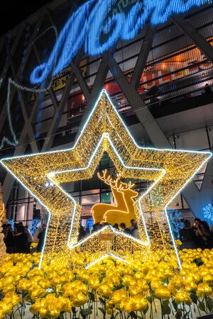 BANGKOK - December 23: Christmas decorated with deer and stars for a Merry Christmas and Happy New Year 2017 at Central World on December 23, 2016 in Bangkok, Thailand.のeditorial素材