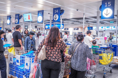 BANGKOK, THAILAND - DECEMBER 25, 2016 : people pay at the counter of IKEA store in cheras ,Founded in 1943, IKEA is the world's largest furniture retailer. IKEA operates 351 stores in 43 countries.のeditorial素材