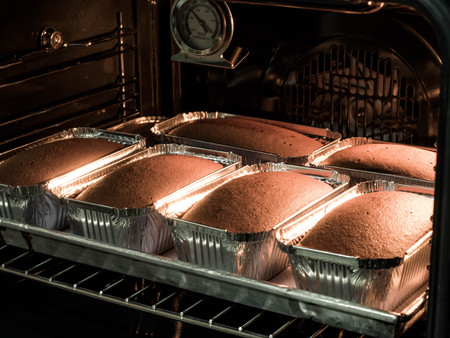 Butter cake are made in the oven. Production oven at the bakery. Baking bread. Manufacture of bread.の写真素材