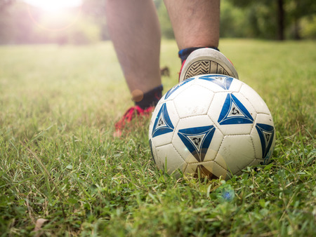 Close up Footballer getting ready to kick a soccer ballのeditorial素材