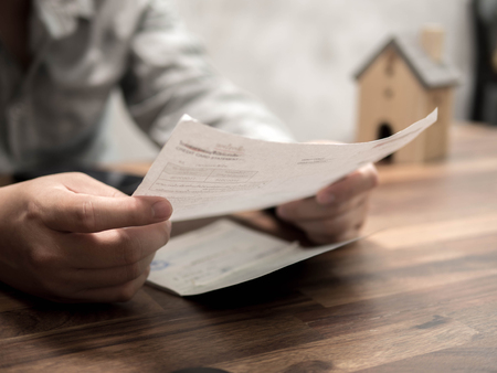 Man having financial problems with home debt and invoices, Money concept., real estate, buy an...