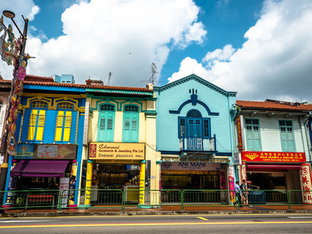 Little India, Singapore - Nov 26, 2018: Unidentified people around Colorful facade of building in...