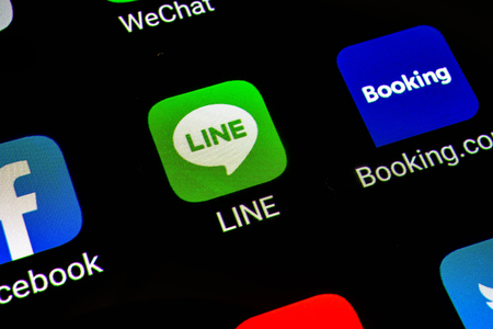 Bangkok, Thailand - June 15 2019: Macro photo of Line application icon on a smartphone screen. Line-Free Calls and Messages app in play store. close up on the Smartphones screen.のeditorial素材