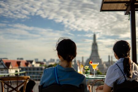 Unidentified Enjoy eating at the bar restaurant beside Wat Arun Rung or Wat Arun is a beautiful backdrop.の写真素材