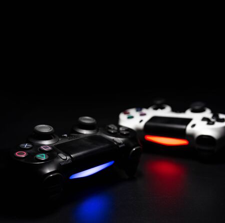 Bangkok, Thailand - September 12, 2019: Close up Sony dualshock 4 controller for PlayStation 4, Black SONY playstation 4 gamepad on black background, Playstation 4 gaming console.のeditorial素材