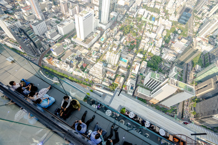 Bangkok, Thailand - September 27 2019: Top view group of people lined up and the city top views. Top...