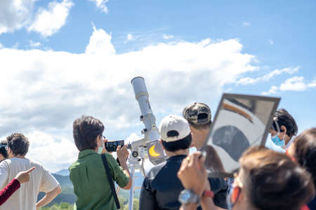 Chiang Mai, Thailand - June 21, 2020 : Partial solar eclipse, People viewing a solar eclipse via DIY telescope with indirect observation method at Princess Sirindhorn AstroPark.のeditorial素材