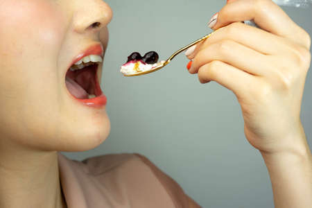 close-up happy pretty girl with sweet dessert.