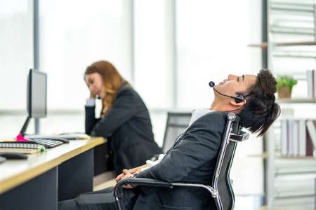 Asian Businessman are stressed while overtime working. Serious and tired working, Upset tired man,...