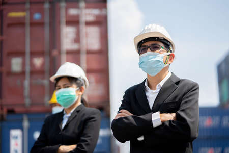 Engineer and staff team for international business logistic import and export concept.