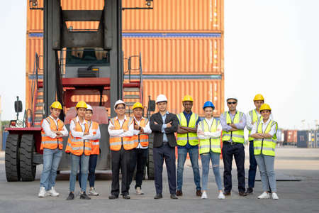 Successful businessmen or engineers congratulate the success of the construction project with the concept of heavy industrial engineering.の写真素材