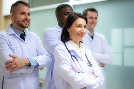 Group of Doctor leading a medical team at the hospital. Professional general practitioners expressing positive emotions.の写真素材