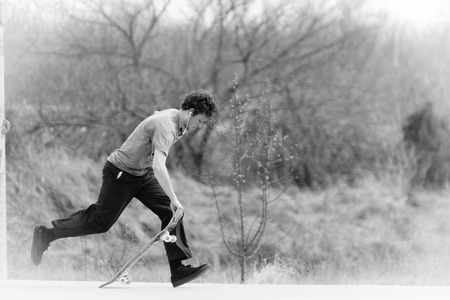 Tulsa, Oklahoma, March 2018, A unknown young man Skate Boarding at a local park in Tulsa, Oklahoma...