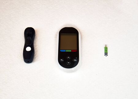 Glucometer. Equipment for measuring blood sugar level.の写真素材