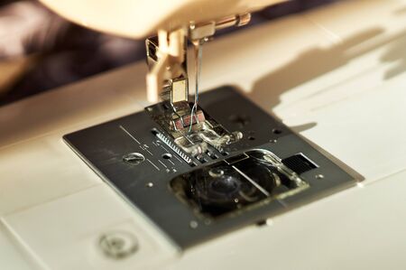Close-up of sewing machine and sewing needle.の写真素材