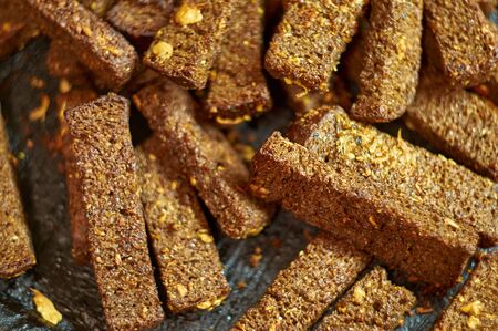 snack of bread toast with garlic, brown rye crouton.
