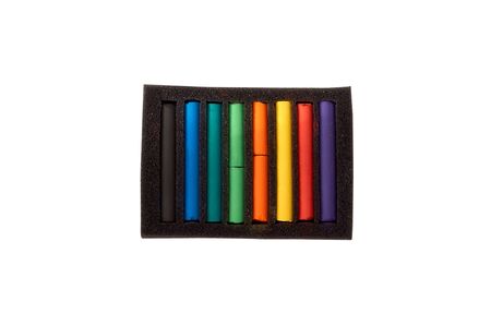 drawing with pastels. Multi-colored pastel pieces in a package isolated.
