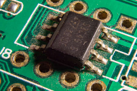 dusty printed circuit Board with components. macro.