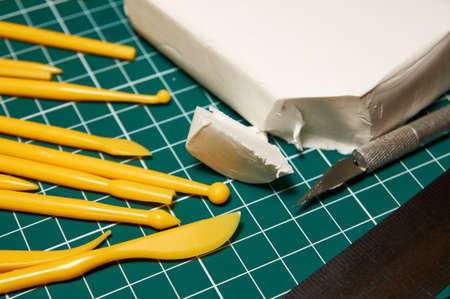 Sculptor's workspace. Tools for molding from polymer clay