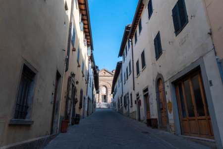 A quiet street of residential buildings in the historic medieval village of Panzano Tuscanyの写真素材