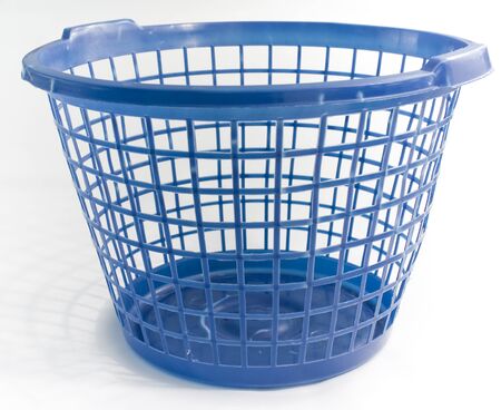 Blue empty laundry basket on whiteの写真素材