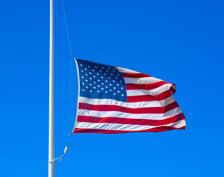 United states flag flying at half staff