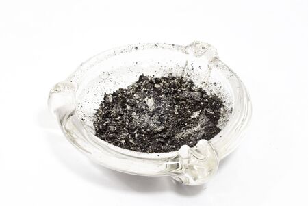 Glass ash tray with ashesの写真素材