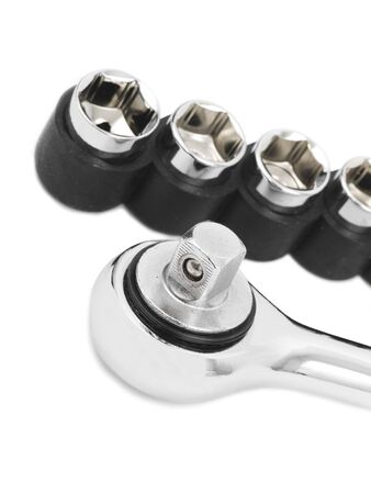 Metal socket wrench on a white background