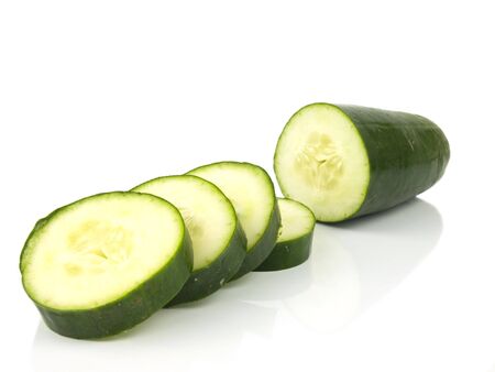 Green Sliced Cucumber on a white Backgroundの写真素材