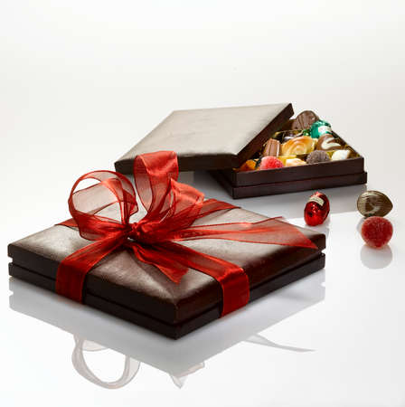 Beautiful gift boxes full of chocolate ready to be offered to mark your love for all kinds of events or special day for your loved ones or your entourages.の写真素材