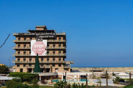 Beirut St george hotel with the sign of stop solidere in Beirut Lebanon 2 February 2018のeditorial素材