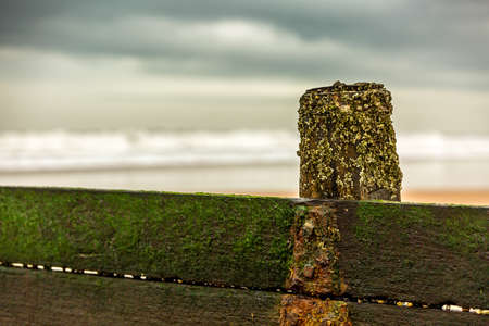 A stormy and blustery day at Blyth beach in Northumberland, as the waves batter the coastの写真素材