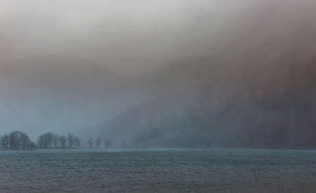 A day of heavy rain in Buttermere in the English Lake District, with the surrounding fells covered...
