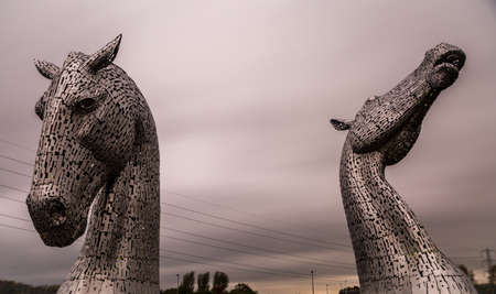 The Kelpies - a sculpture of a pair of giant metallic silver horse heads in Falkirk, Scotlandのeditorial素材