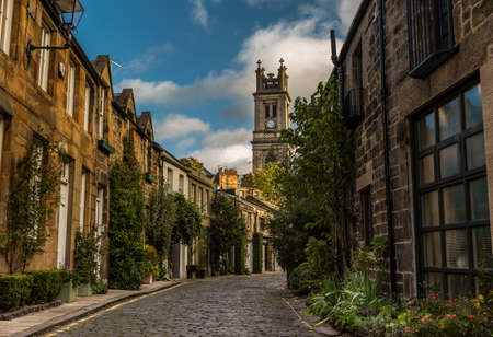 The beautiful picturesque cobbled street of Circus Lane, only a couple of minutes walk away from Edinburgh City center, Scotlandの写真素材