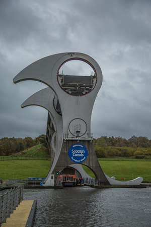 The Falkirk Wheel is a rotating boat lift in Falkirk, Scotland, connecting the Forth and Clyde Canal with the Union Canal.の写真素材