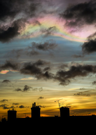 Nacreous clouds - also known as Rainbow clouds or Mother-of-Pearl clouds - are a rare type of cloud which form very high in the atmosphere and glow in vivid colorsの写真素材
